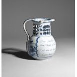 A Liverpool delftware puzzle jug c.1740-50, the rounded body inscribed in blue with 'From Mother