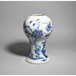 A massive delftware vase c.1760, probably Liverpool, the baluster form painted in blue with a