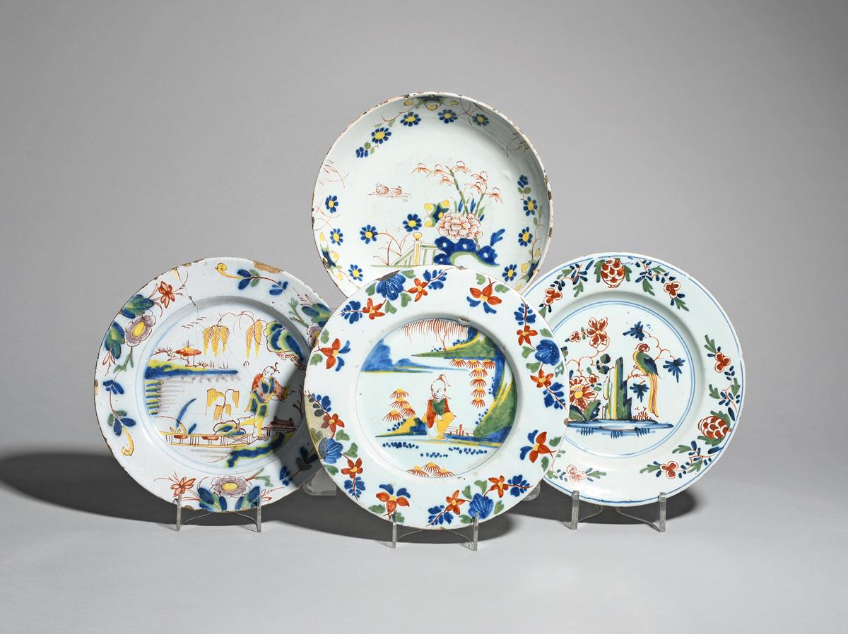 Two Lambeth delftware plates c.1740, both painted in red, yellow, green and blue, one with a