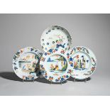 Two Lambeth delftware plates c.1740, both painted in red, yellow, green and blue, one with a