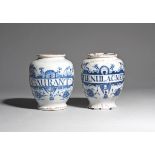 Two delftware dry drug jars mid 18th century, of ovoid shape, each painted in blue with a narrow