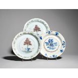 A pair of delftware plates c.1740-60, probably Lambeth, of simple shape, each painted with a