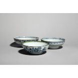 Three shallow delftware bowls c.1770-80, one inscribed 'One Bowl More & then' to the interior