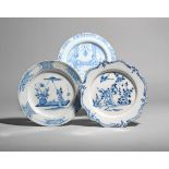 Three delftware plates c.1750, one painted in blue with a Chinese boy jumping to catch a bird,