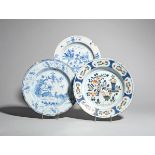 Two large delftware plates c.1730-40, one Liverpool and painted in blue with two cockerels beneath a