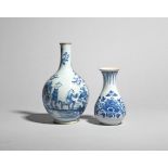 Two delftware vases mid 18th century, one Liverpool and painted in blue with flowering peony sprays,