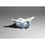 A rare delftware two-handled sauceboat c.1760-70, the double-ended form painted in blue with a