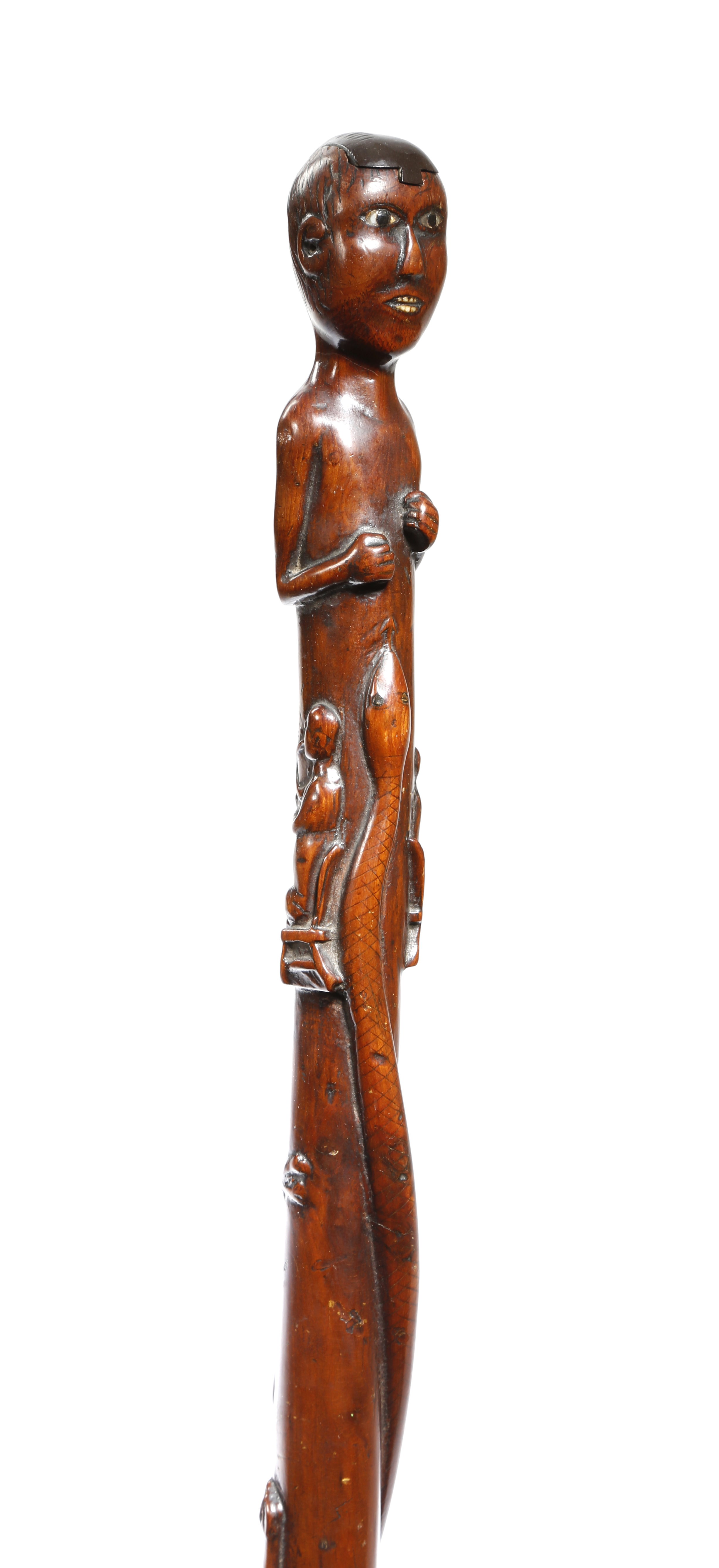 A folk art carved wood naive walking cane, the handle in the form of a native with a sliding cover - Image 2 of 4