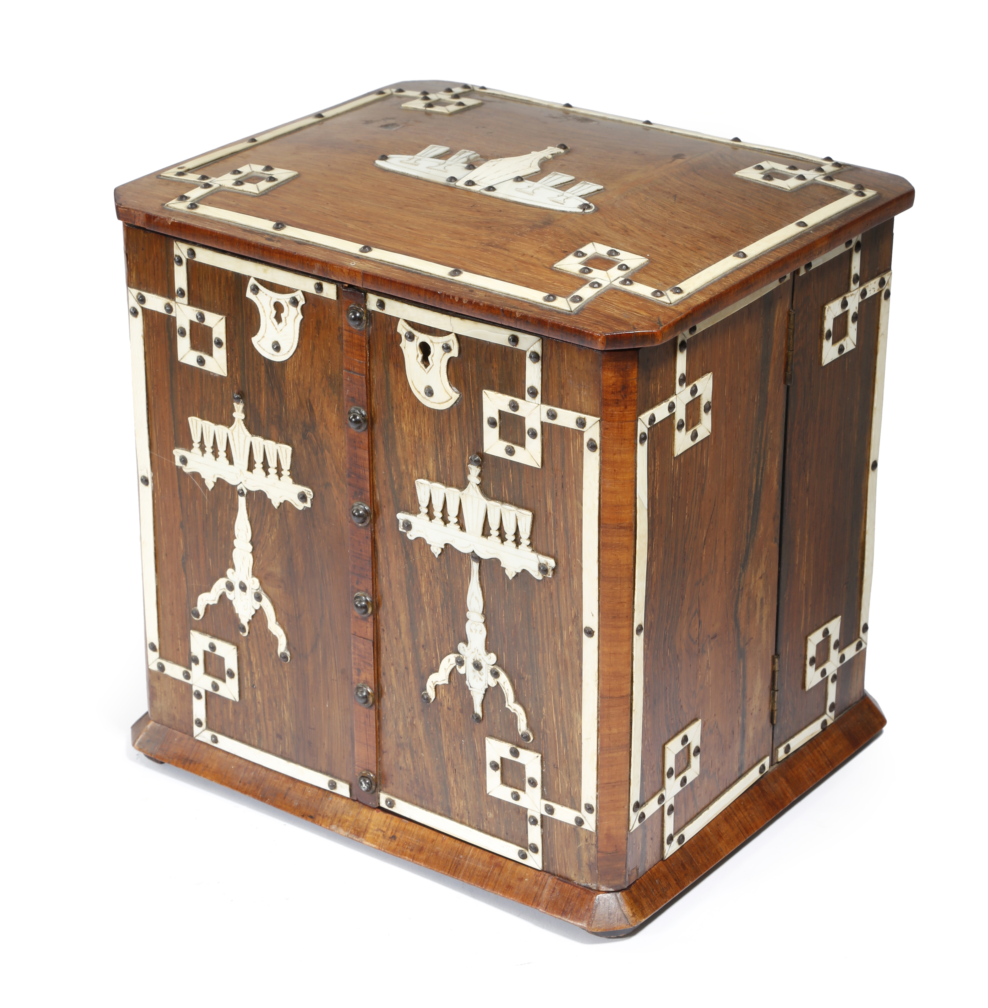 λ A 19th century French rosewood and ivory mounted tantalus, with a hinged lid and sides, applied