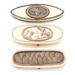 λ A collection of three George III ivory toothpick boxes, comprising: a gold-mounted one of oblong