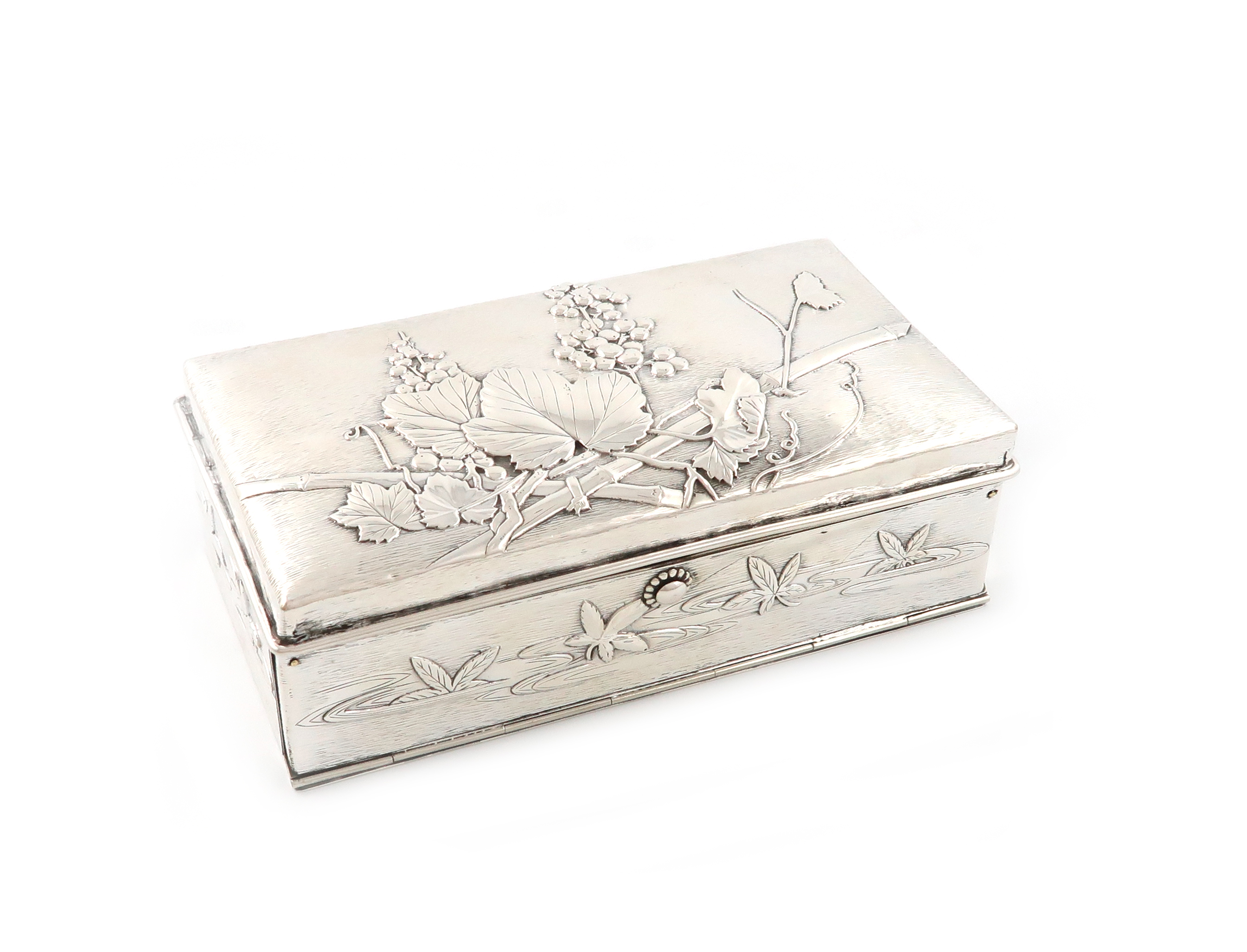 A Japanese silver dressing table / playing cards box, retailed by J. Kuhn and Co, Kobe,