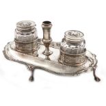 A George III silver inkstand, by William Plummer, London 1778, shaped rounded rectangular form,