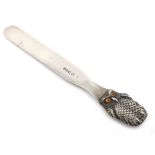 A Victorian novelty silver owl paper knife, by S. Mordan and Co, London 1895, the handle modelled as
