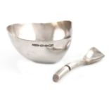By Elizabeth Peers, a modern silver sugar bowl and spoon, London 2009, shaped circular form,