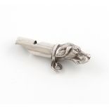 A late-Victorian novelty silver whistle, by H W Ashford, Birmingham 1897, modelled as a dog's