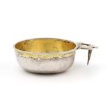 A late 17th / early 18th century Swedish parcel-gilt silver wine taster, unmarked, circa 1700,