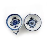 Two Derby blue and white wine tasters, c.1765-75, one with gadroon moulding to the exterior, the