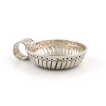 A late 18th century French silver wine taster, marks worn, also with a later mark, circular form,