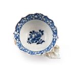 A Bow blue and white wine taster, c.1760-65, of deep ogee form, painted to the interior with a small