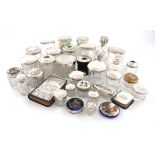 A collection of silver-mounted dressing table jars and items, comprising: a Victorian silver-mounted