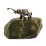 A silver model of an elephant, by S. Mordan and Co, Chester 1910, modelled in a standing position,
