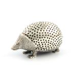 An Edwardian novelty silver porcupine pin cushion, maker's mark worn, London 1903, modelled in a