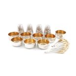 By Leslie Durbin, a modern twelve-piece silver condiment set, London 1971, circular tapering form,