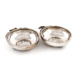 A pair of South American silver wine tasters, unmarked, Ecuador, circa 1900, circular form, double