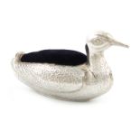 An Edwardian novelty silver duck pin cushion, by S. Mordan and Co, Chester 1905, modelled in a