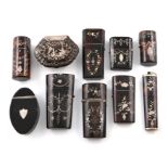λ A collection of ten 18th and 19th century silver-mounted and inlaid tortoiseshell boxes,