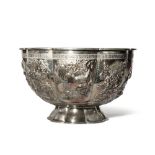 A CHINESE EMBOSSED SILVER LOBED BOWL 19TH CENTURY The deep bowl shaped as a flower with eight