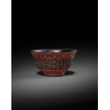 A RARE CHINESE IMPERIAL INSCRIBED TWO-COLOUR LACQUER TEA BOWL SIX CHARACTER QIANLONG MARK AND OF THE