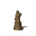 A TIBETAN BRONZE SCULPTURE OF PADMAPANI 17TH/18TH CENTURY Standing on a semi-circular lotus throne