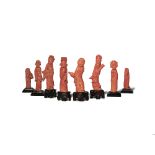 EIGHT SMALL CHINESE CORAL FIGURES LATE QING DYNASTY The figures carved as Damo, Shoulao, the