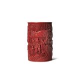 A RARE CHINESE CINNABAR LACQUER BITONG 18TH CENTURY The cylindrical body carved in relief over a