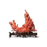 A LARGE CHINESE CORAL 'BOYS' GROUP LATE QING DYNASTY/REPUBLIC PERIOD Carved with three playful