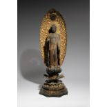 A JAPANESE LACQUERED WOOD FIGURE OF AMIDA NYORAI MUROMACHI OR LATER, 15TH CENTURY OR LATER Of