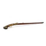 A JAPANESE MATCHLOCK CARBINE EDO PERIOD, 19TH CENTURY With an iron octagonal-section barrel, the