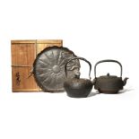 TWO JAPANESE CAST-IRON KETTLES AND COVERS, TETSUBIN MEIJI PERIOD OR LATER, 19TH OR 20TH CENTURY