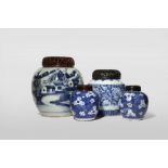FOUR CHINESE BLUE AND WHITE OVOID VASES 18TH CENTURY Variously decorated with peony blooms, prunus