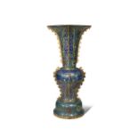 A MASSIVE CHINESE CLOISONNE GU-SHAPED VASE 20TH CENTURY Decorated with lotus flowerheads amidst