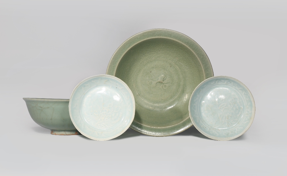 TWO CHINESE CELADON BOWLS AND A PAIR OF QINGBAI DISHES SONG DYNASTY OR LATER One celadon bowl