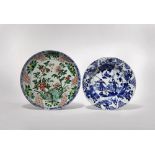 A CHINESE FAMILLE VERTE DISH AND A BLUE AND WHITE DISH KANGXI 1662-1722 The famille verte dish