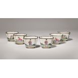 A SET OF SIX SMALL CHINESE CANTON ENAMEL FAMILLE ROSE WINE CUPS 18TH CENTURY Each decorated with