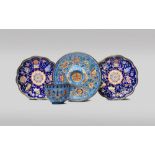 A CHINESE CANTON ENAMEL CUP, A PAIR OF ENAMEL DISHES, AND A STAND 18TH CENTURY The exterior of the