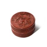 A CHINESE CINNABAR LACQUER CIRCULAR BOX AND COVER 18TH/19TH CENTURY The cover carved with a sage and