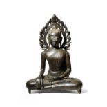 A SOUTHEAST ASIAN BRONZE FIGURE OF BUDDHA 19TH/20TH CENTURY Seated in dhyanasana, with his left hand