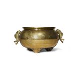A CHINESE BRONZE TRIPOD INCENSE BURNER QING DYNASTY The compressed circular body engraved with six