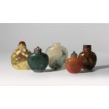 FIVE CHINESE HARDSTONE SNUFF BOTTLES QING DYNASTY Comprising: one filigree-mounted spinach-green