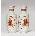 A PAIR OF CHINESE IRON-RED ROULEAU VASES 19TH CENTURY The tall body of each painted in iron-red with